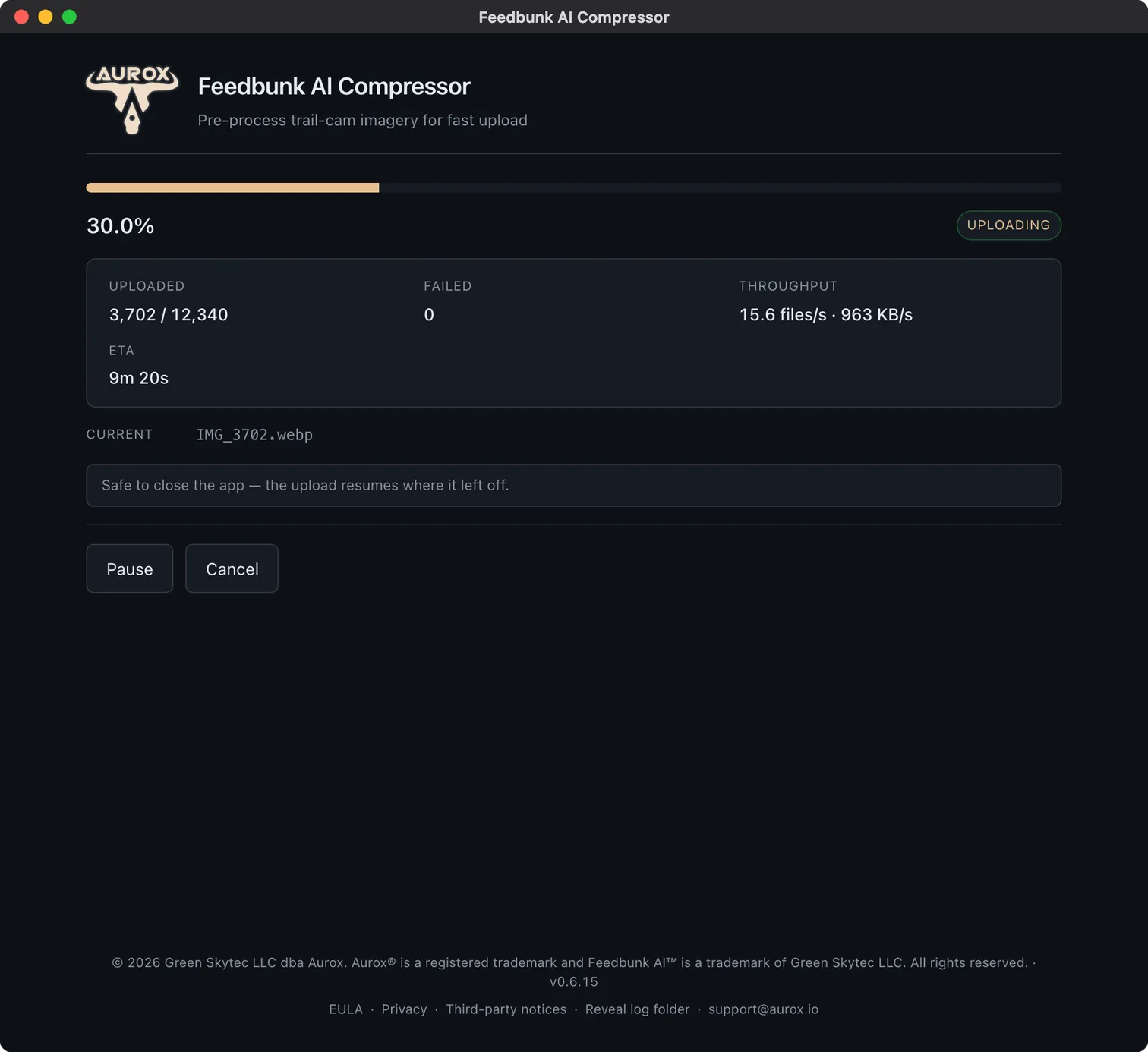 Desktop app uploading the compressed batch at 30 percent with a resumable progress bar